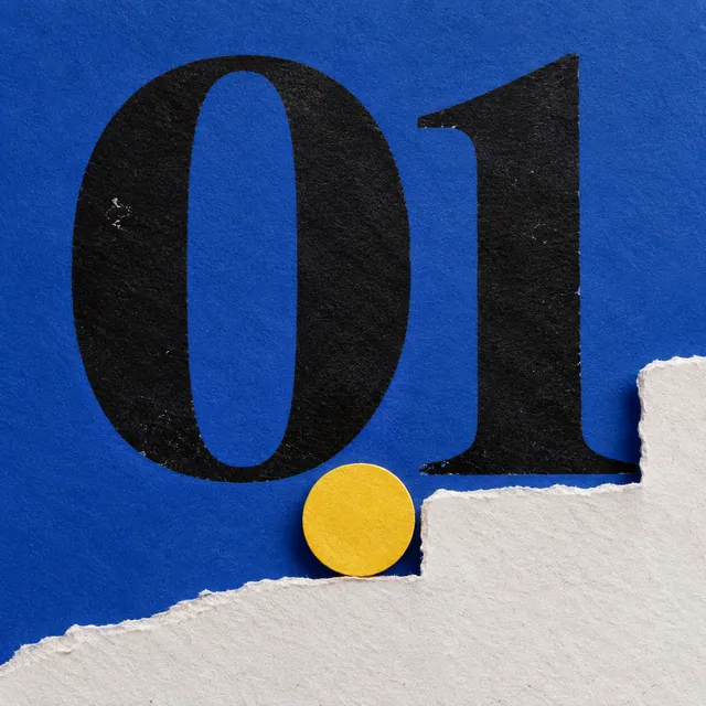 A blue number one sculpted from paper
